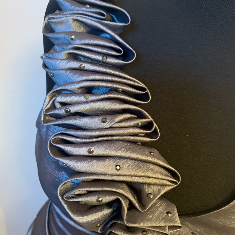 Form fitting silver dress with rhinestone accents. - Picture 2 of 4